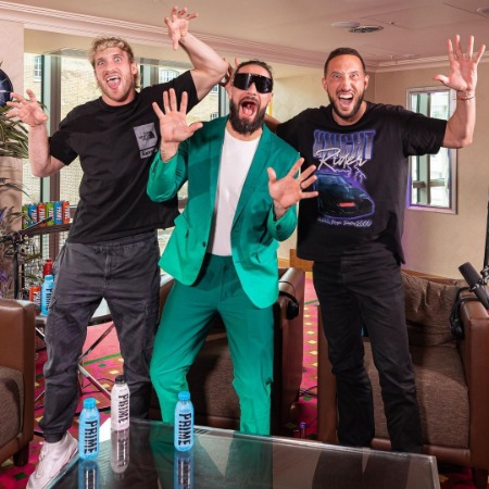 Seth Rollins with Logan Paul and Mike Majlak.